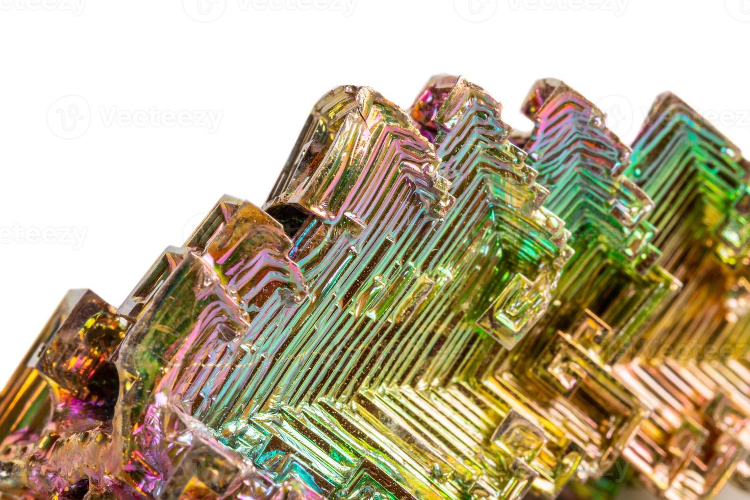Macro of the mineral bismuth stone on a white background photo