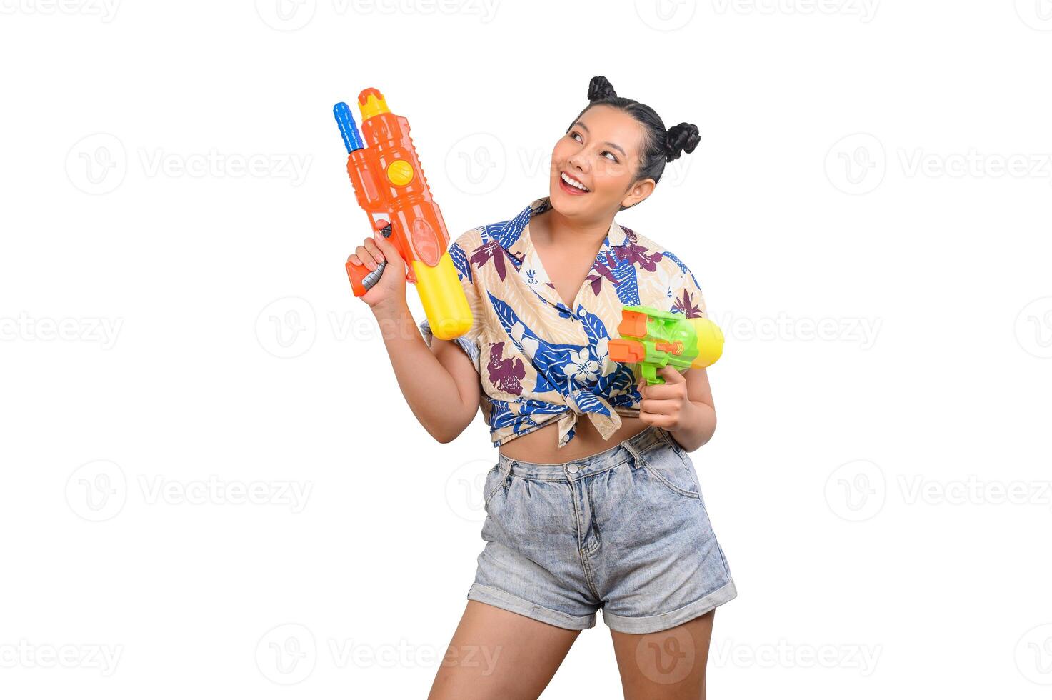 Portrait smiley woman in Songkran festival with water gun photo