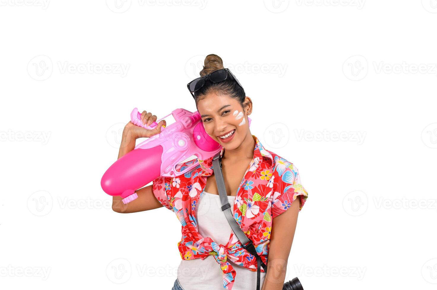 Portrait cute woman in Songkran festival with water gun photo