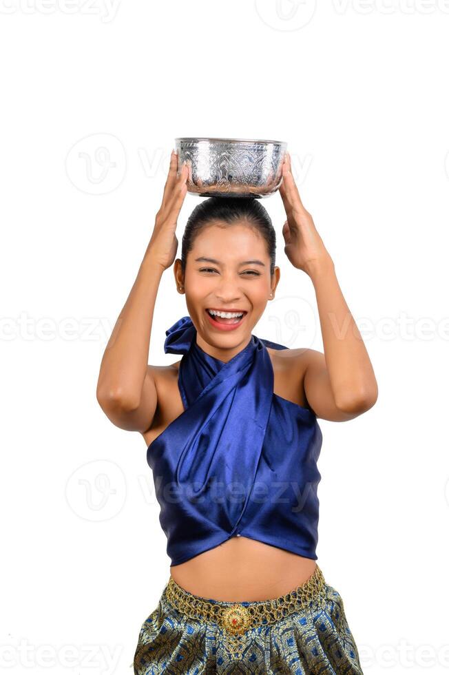 Portrait pretty woman in Songkran festival with water bowl photo