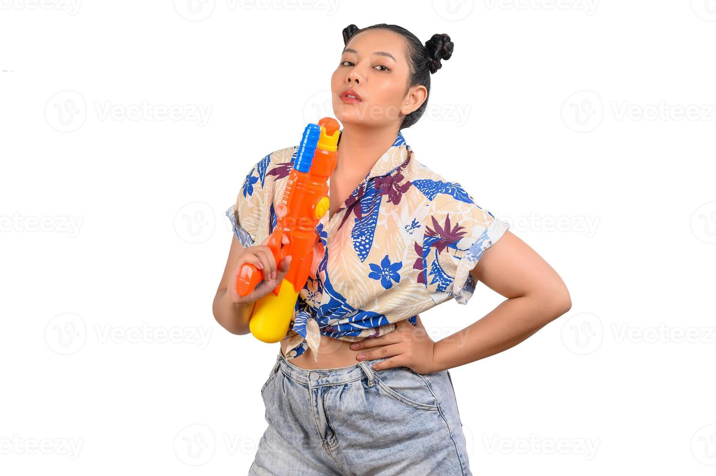 Portrait cute woman in Songkran festival with water gun photo