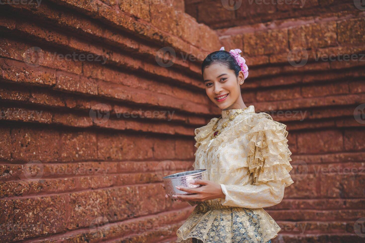 Portrait beautiful woman in Songkran festival with Thai Traditional costume photo