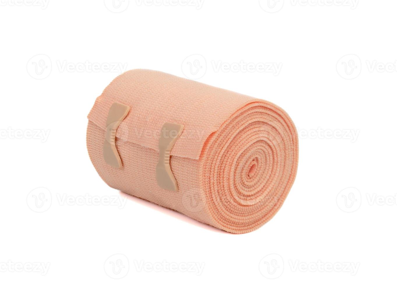 Medical elastic bandage roll isolated on white background photo