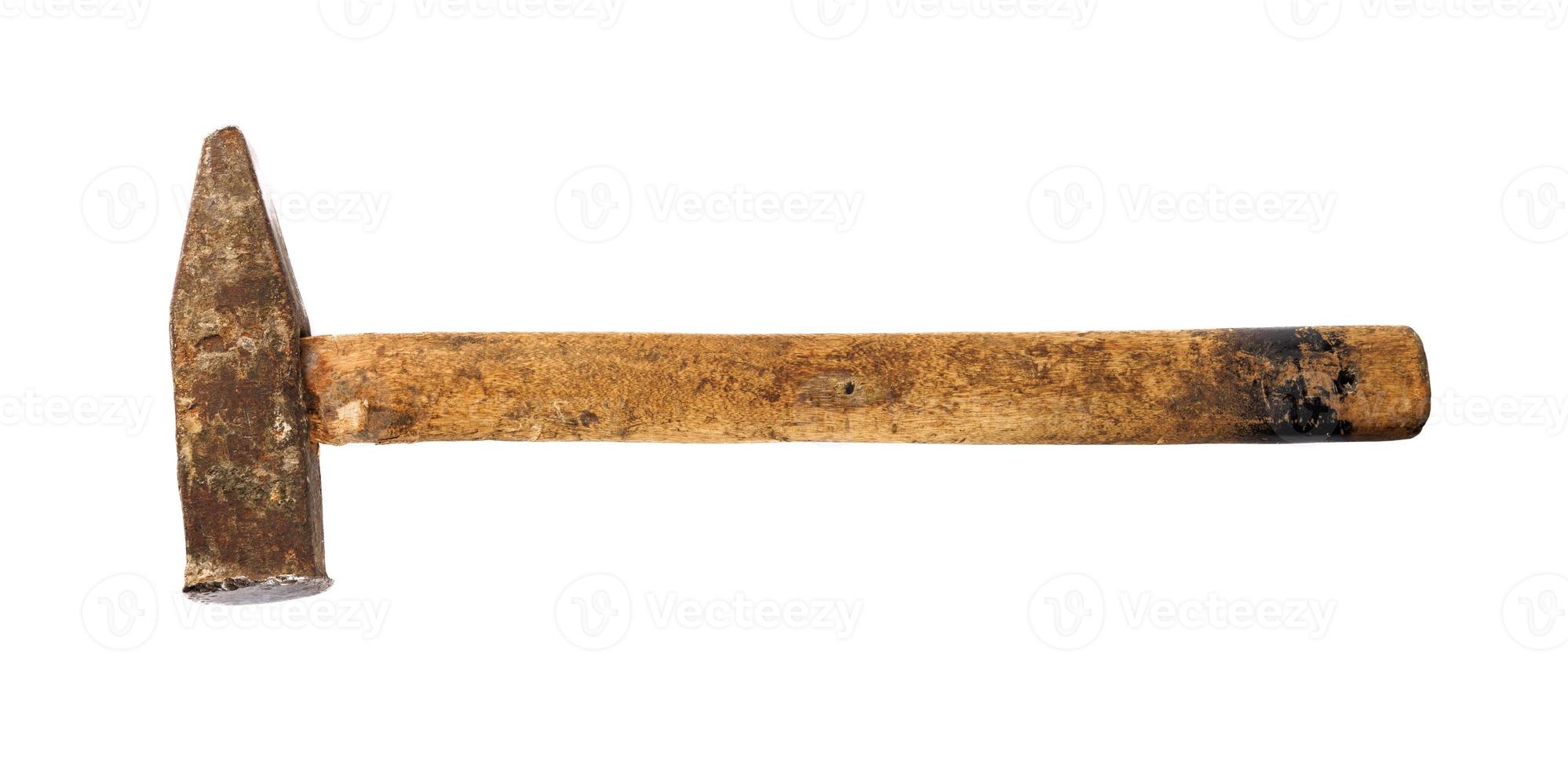 Old rusty hammer with wooden handle isolated on white background. photo
