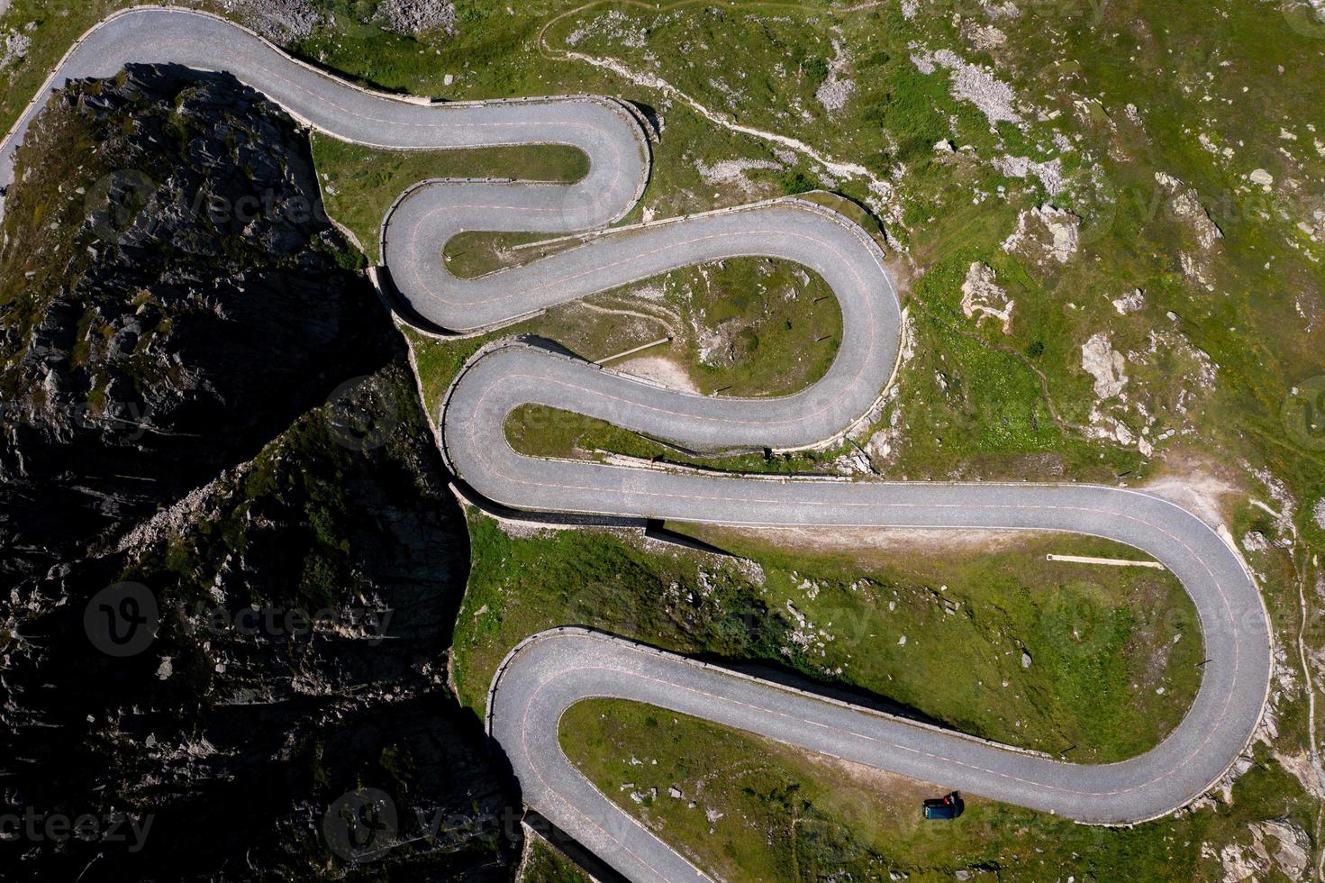 A green pass road from above photo