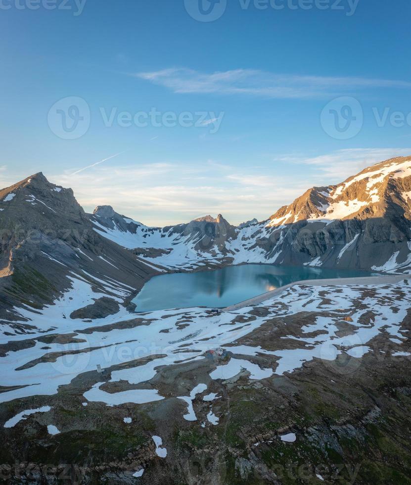 Swiss turkish mountain lake, under blue sky photo