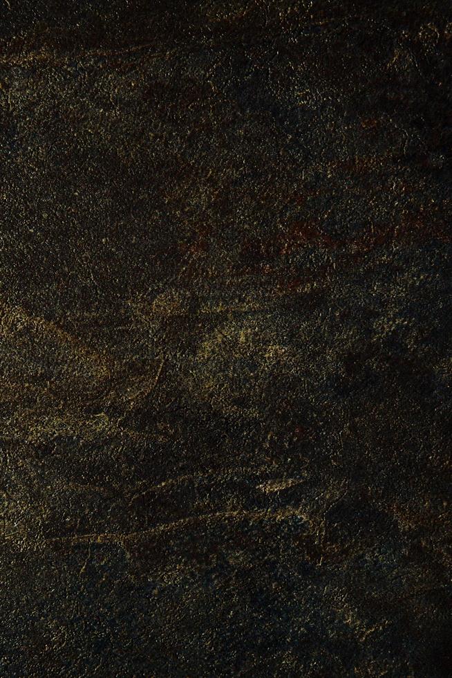 Black and golden marble textured background photo