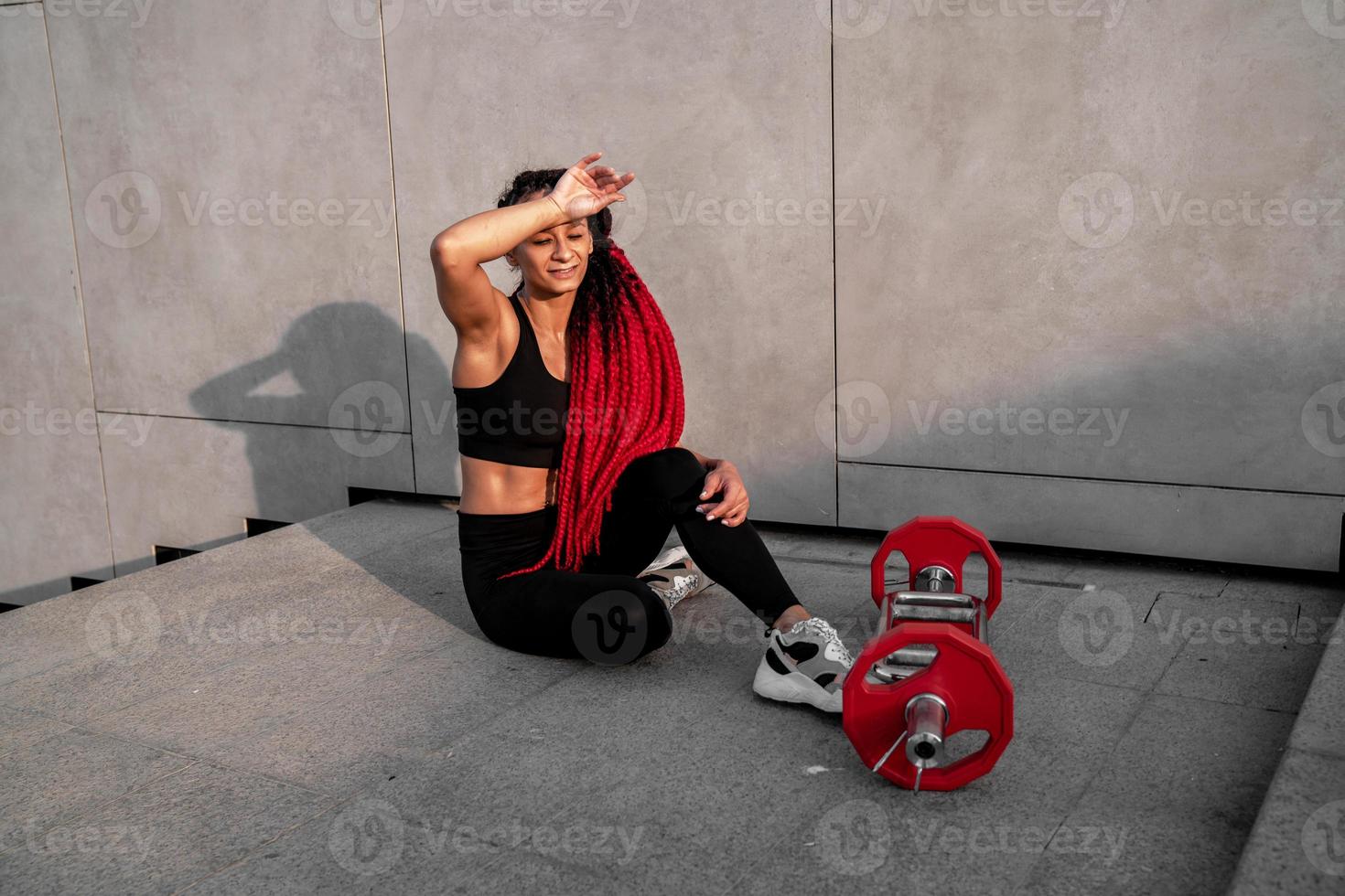 Fitness, body builder and woman with barbell training, workout or challenge exercise for muscle power, energy and goal. Strong, power and sports person with gym motivation and bodybuilder challenge photo