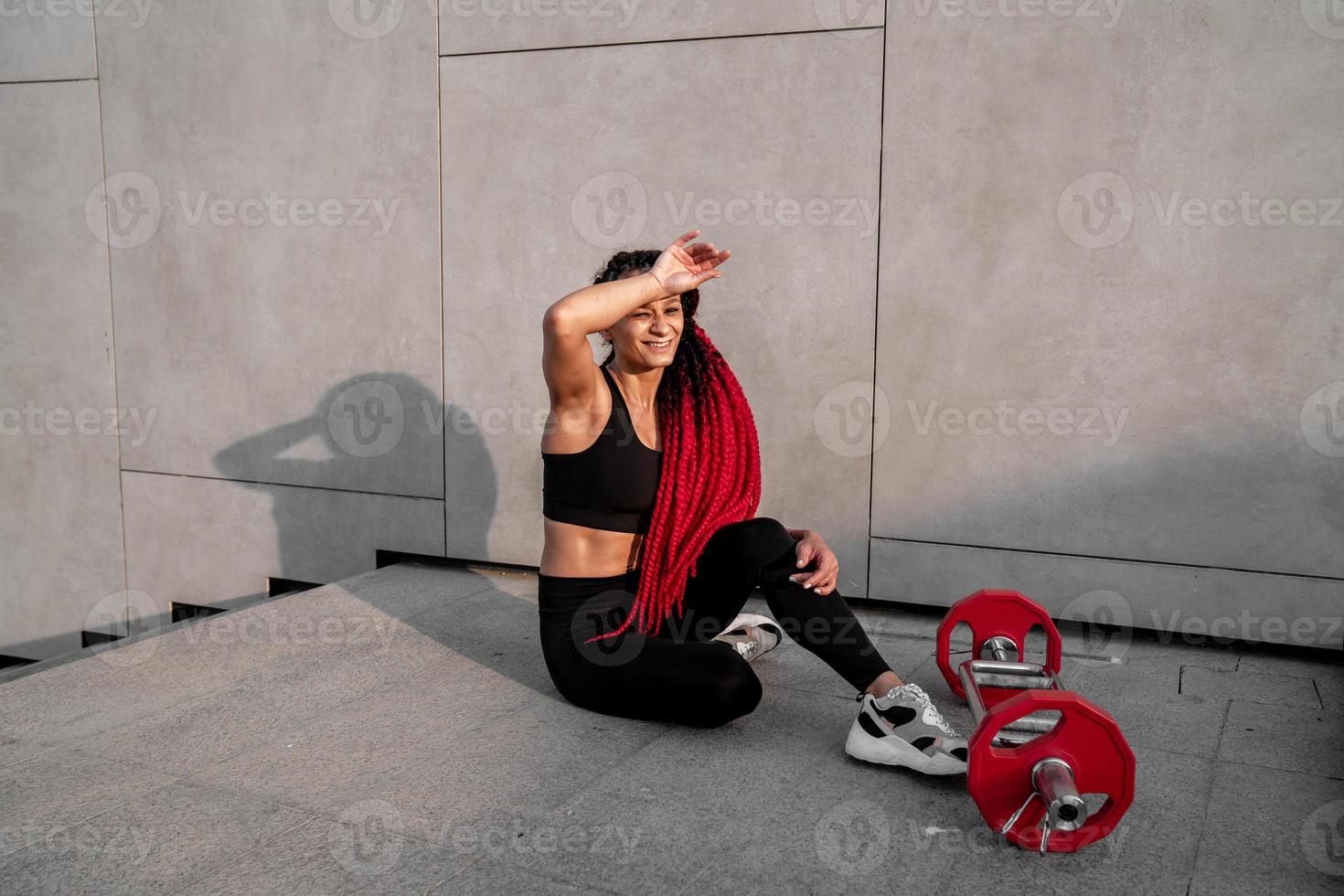 Fitness, body builder and woman with barbell training, workout or challenge exercise for muscle power, energy and goal. Strong, power and sports person with gym motivation and bodybuilder challenge photo