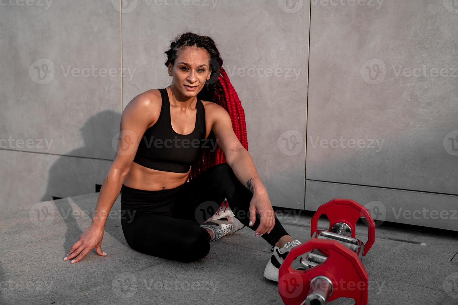 Fitness, body builder and woman with barbell training, workout or challenge exercise for muscle power, energy and goal. Strong, power and sports person with gym motivation and bodybuilder challenge photo