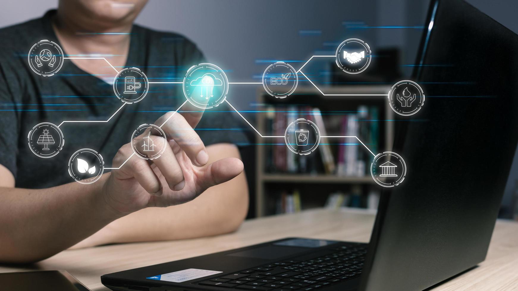 hand touch hologram screen to green energy,and reduce global warming,sustainable business investments,carbon credit,eco friendly investment,ESG for Environment Social and Governance. photo