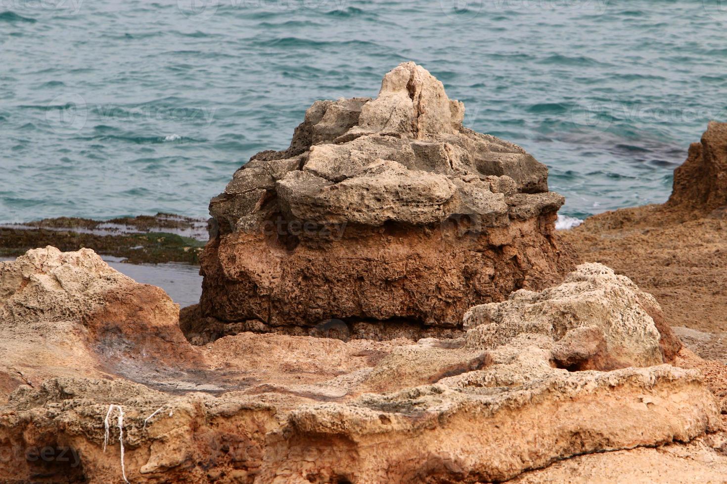 Rocky shore of the Mediterranean Sea in northern Israel. photo