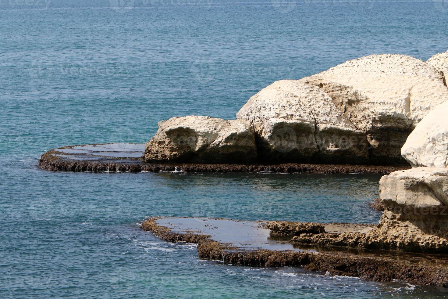Rocky shore of the Mediterranean Sea in northern Israel. photo