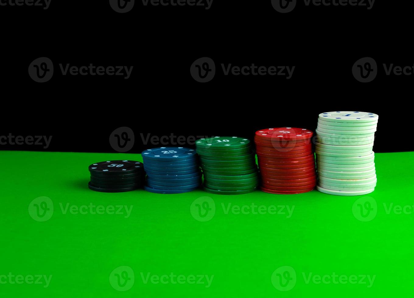 Poker game, Stacks of chips on the poker table. photo