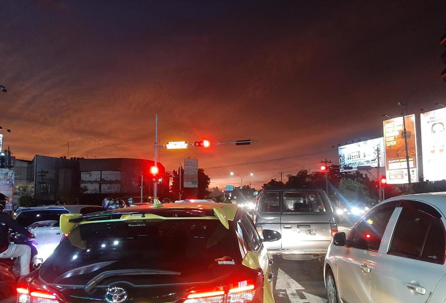 Indonesia, Yogyakarta January 10, 2023, a traffic jam that occurred at a red light intersection photo