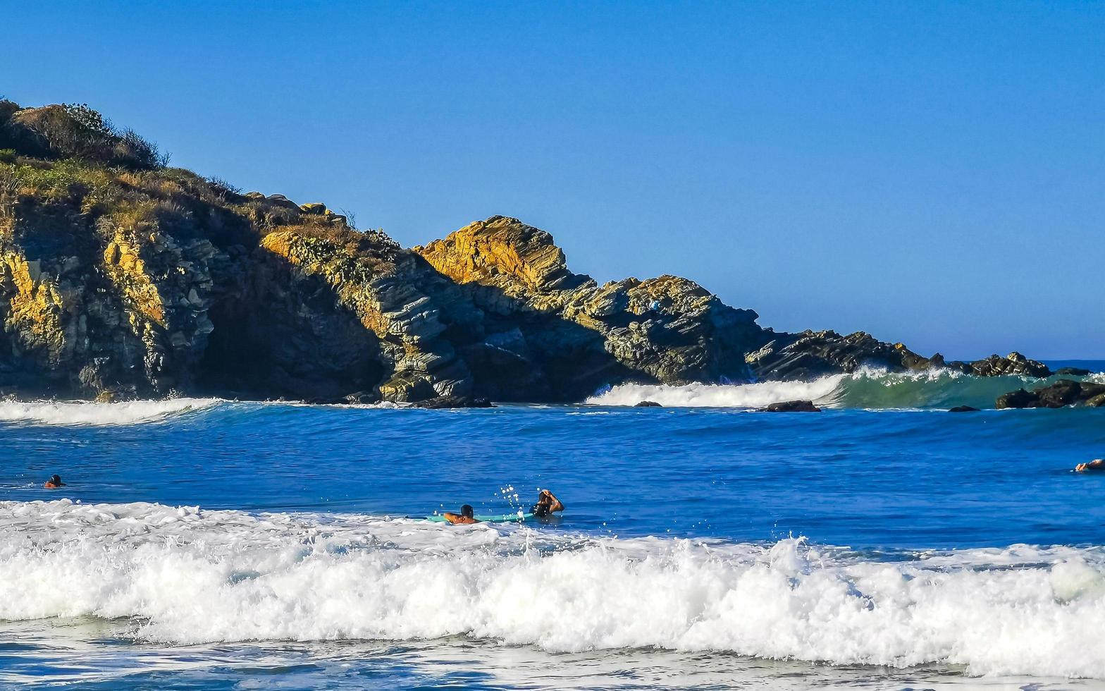 Puerto Escondido Oaxaca Mexico 2023 Surfer surfing on surfboard on high waves in Puerto Escondido Mexico. photo