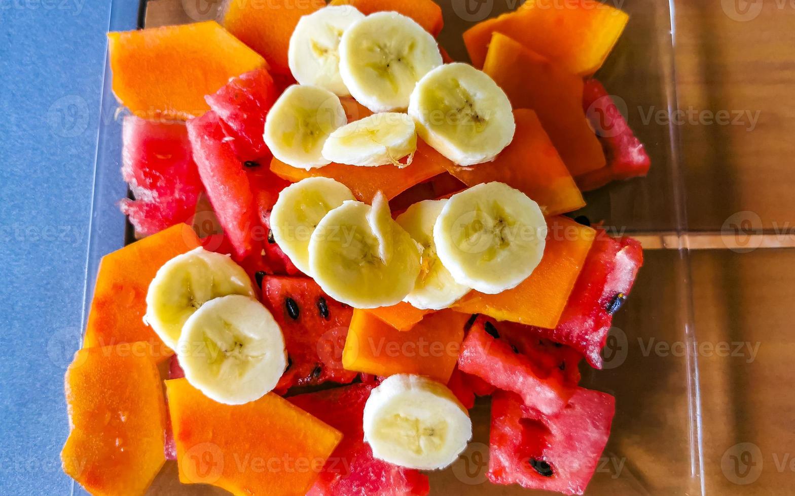 Breakfast at restaurant fruits fruit salad with oatmeal.. photo