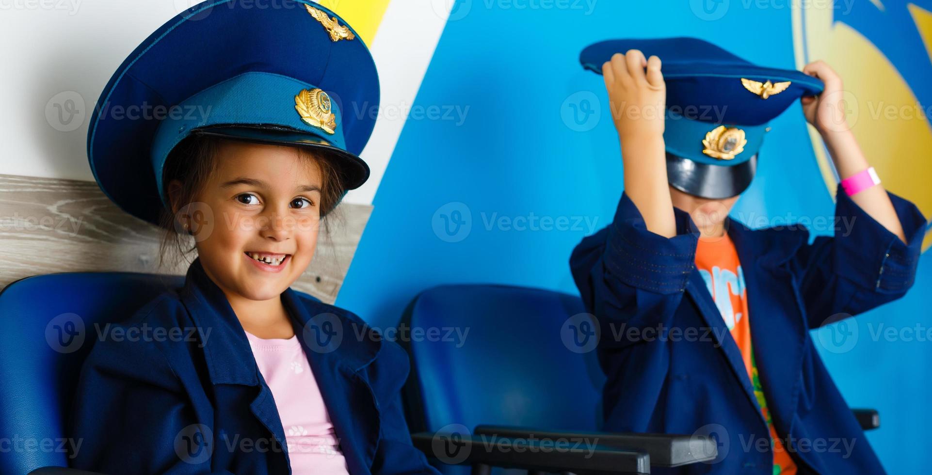 Happy kids playing airplane. Portrait of children photo