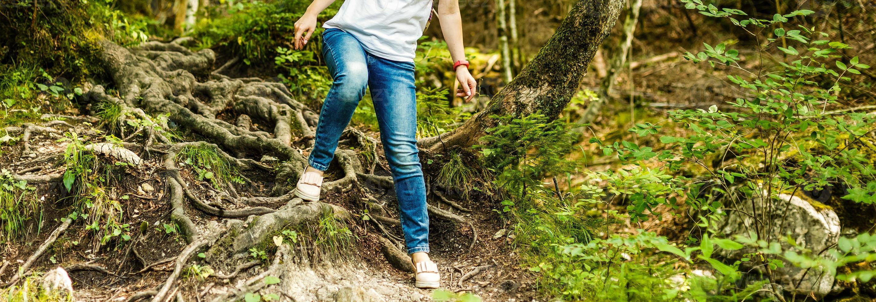 Free traveler girl in mountains with backpack mountaineering Travel Lifestyle concept landscape on background vacations adventure journey outdoor, human and nature photo