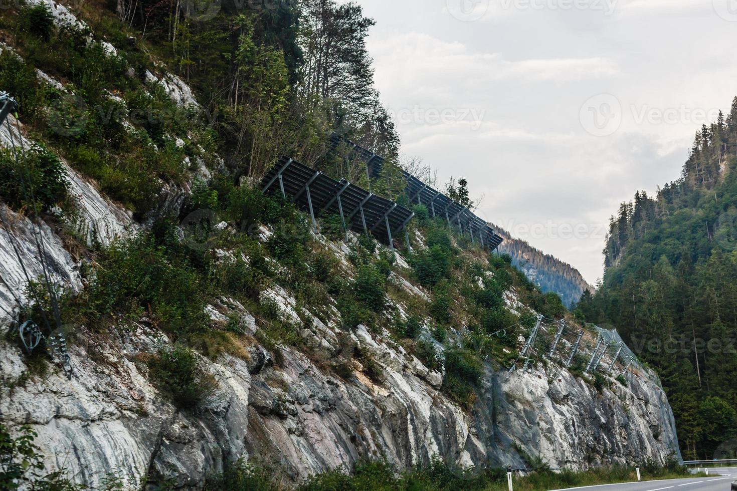 Protection wire mesh against falling rocks from the mountains photo