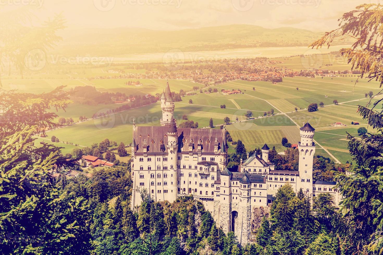 Beautiful view of world-famous Neuschwanstein Castle, the nineteenth-century Romanesque Revival palace built for King Ludwig II on a rugged cliff near Fussen, southwest Bavaria, Germany photo