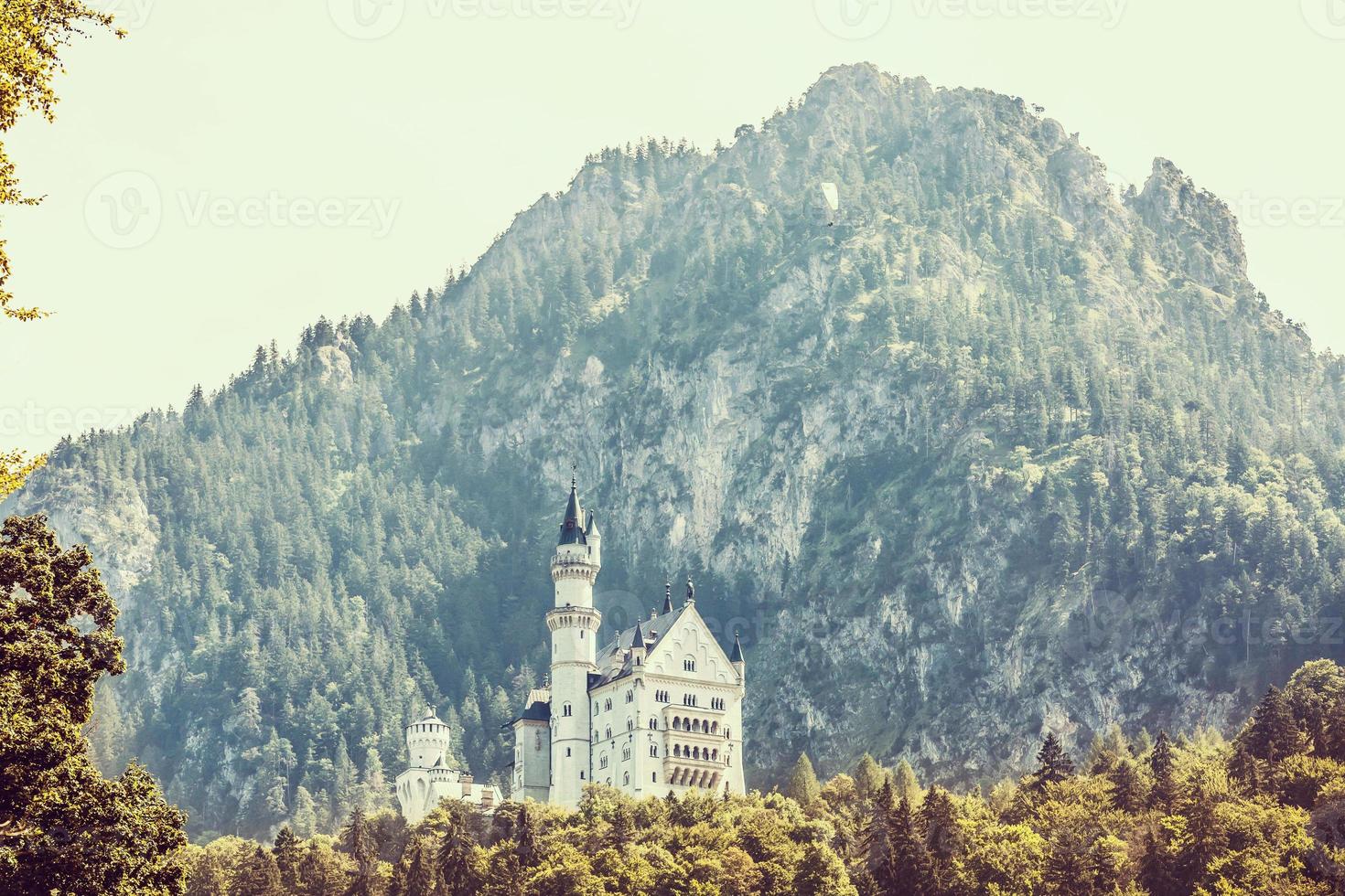 Beautiful view of world-famous Neuschwanstein Castle, the nineteenth-century Romanesque Revival palace built for King Ludwig II on a rugged cliff near Fussen, southwest Bavaria, Germany photo