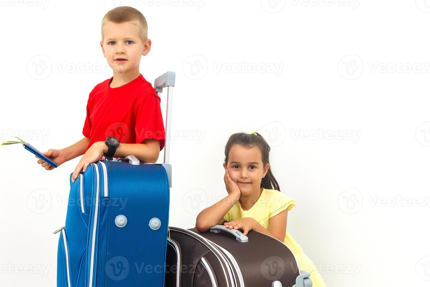 Adorable kids brther and sisterwith a suitcase sitting while travelling copyspace family kids children vacation trip geography childhood responsible memories enjoyment photo