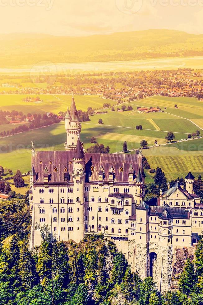 Beautiful view of world-famous Neuschwanstein Castle, the nineteenth-century Romanesque Revival palace built for King Ludwig II on a rugged cliff near Fussen, southwest Bavaria, Germany photo