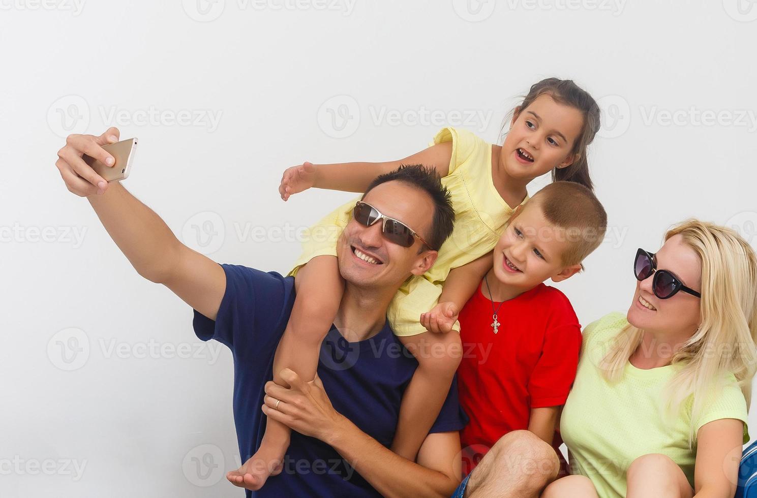 Happy family with luggage are ready to travel. Isolated on white background. photo