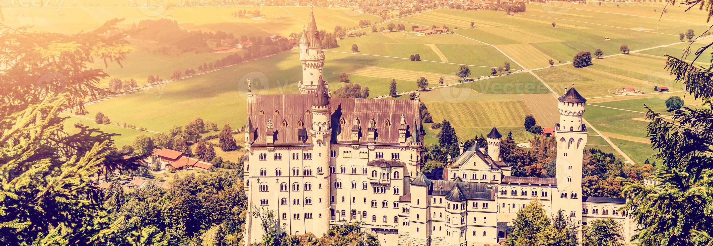 Beautiful view of world-famous Neuschwanstein Castle, the nineteenth-century Romanesque Revival palace built for King Ludwig II on a rugged cliff near Fussen, southwest Bavaria, Germany photo