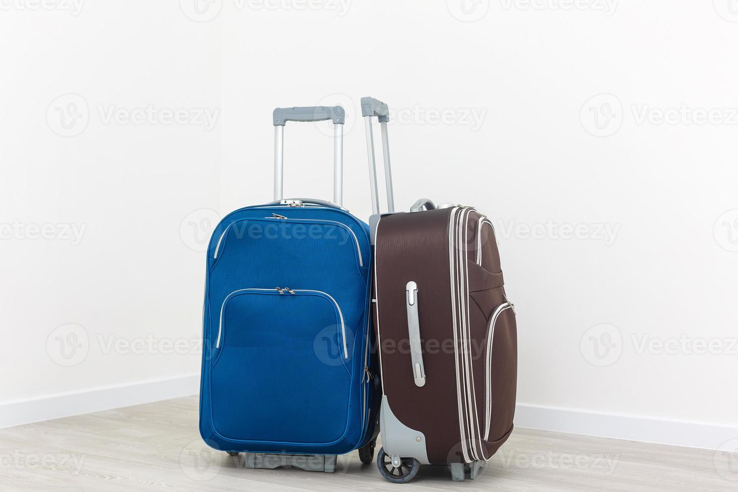 Travel suitcases isolated on white background. photo