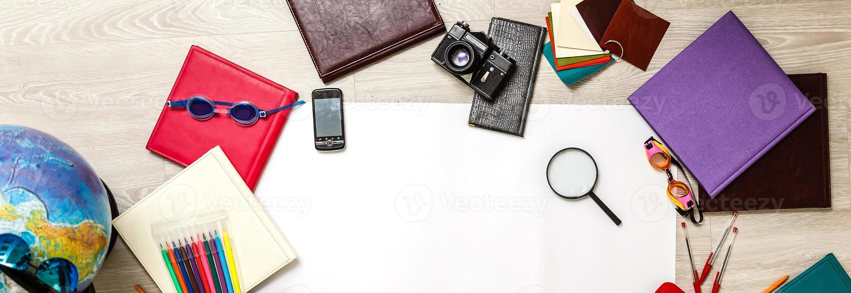 School office supplies on a desk with copy space. Back to school concept. photo