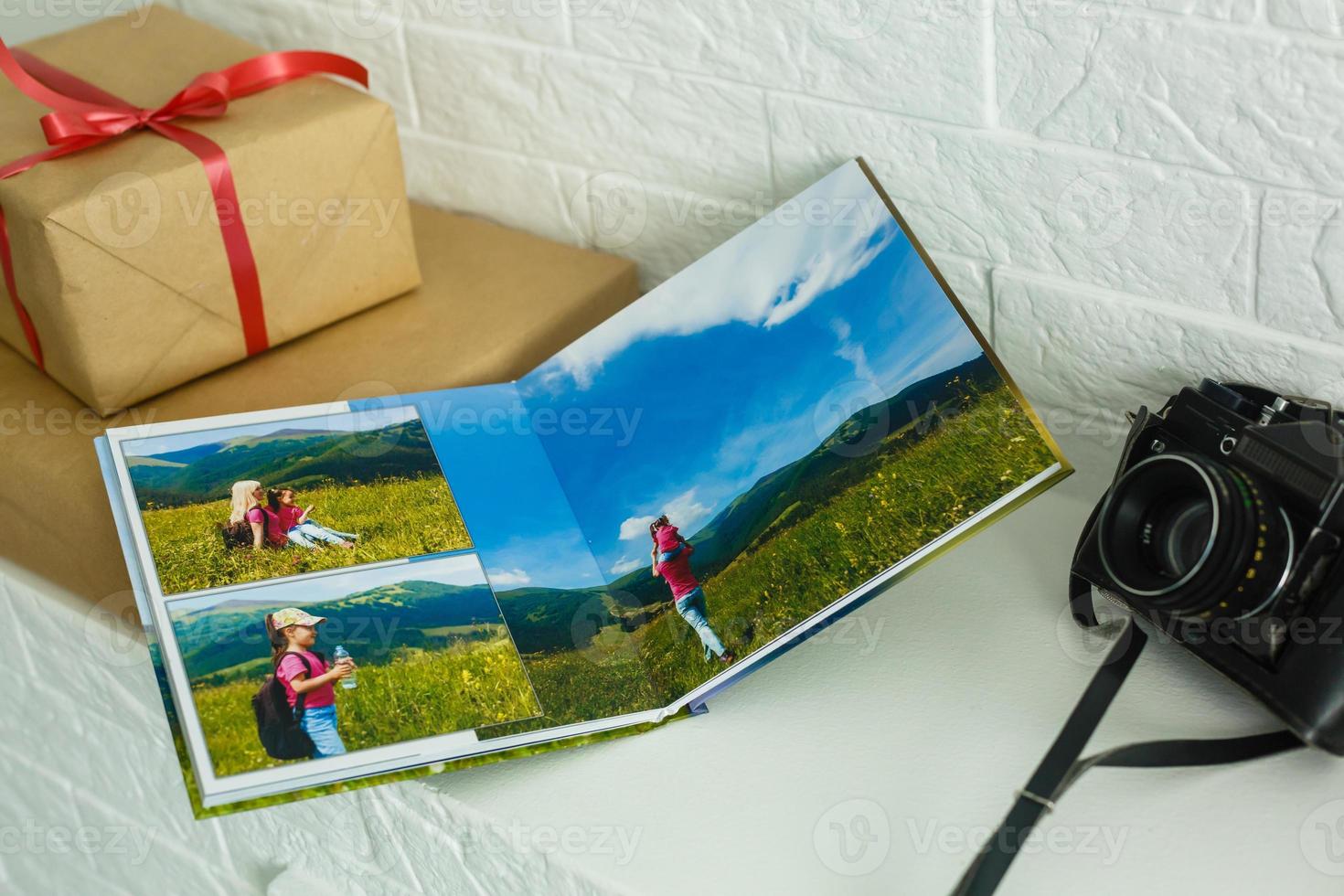 photos from holiday in mountains with traditional white frame placed