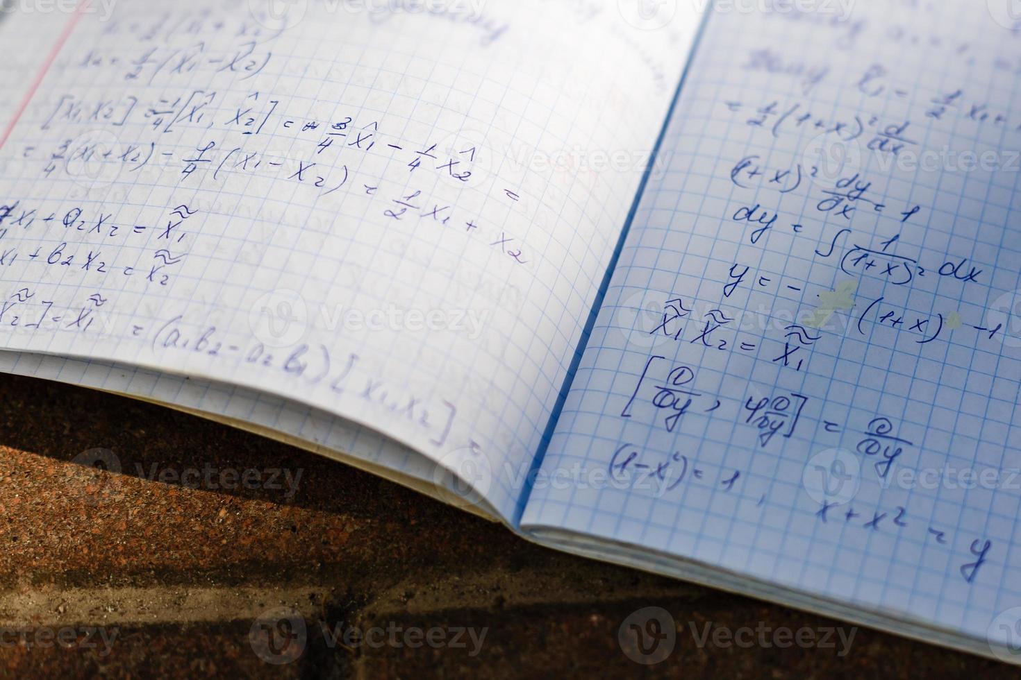 A school notebook with formulas photo