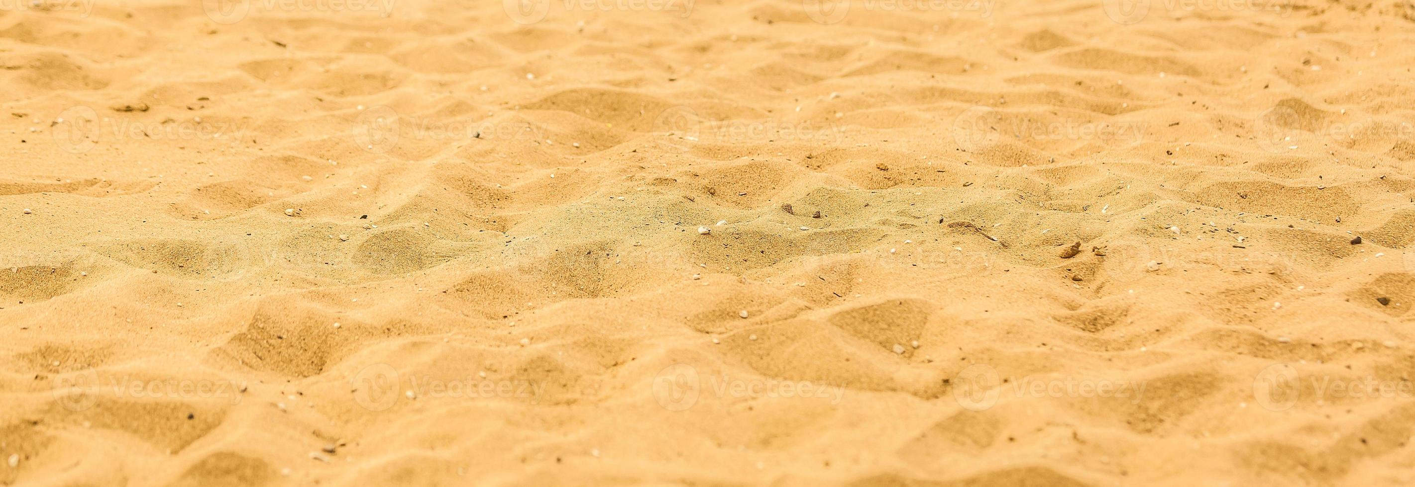 closeup of sand pattern of a beach in the summer photo