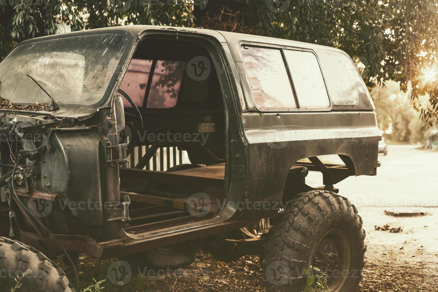 Old Automobile in a farm photo