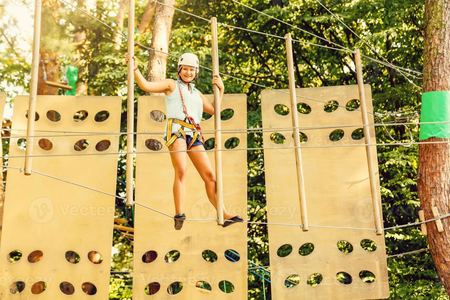 Woman on the roping park photo