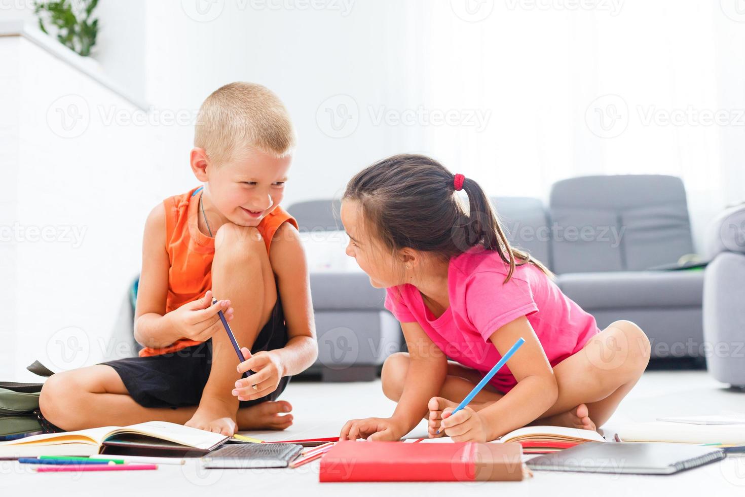 Covid-19 Coronavirus and Learning from home, Home school kid concept. Little children study online learning from home with laptop. Quarantine and Social distancing concept. photo