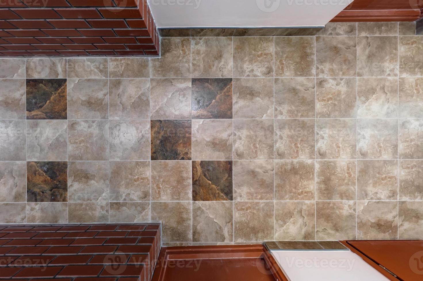 stone and ceramic floor tiles texture in corridor, view from above photo