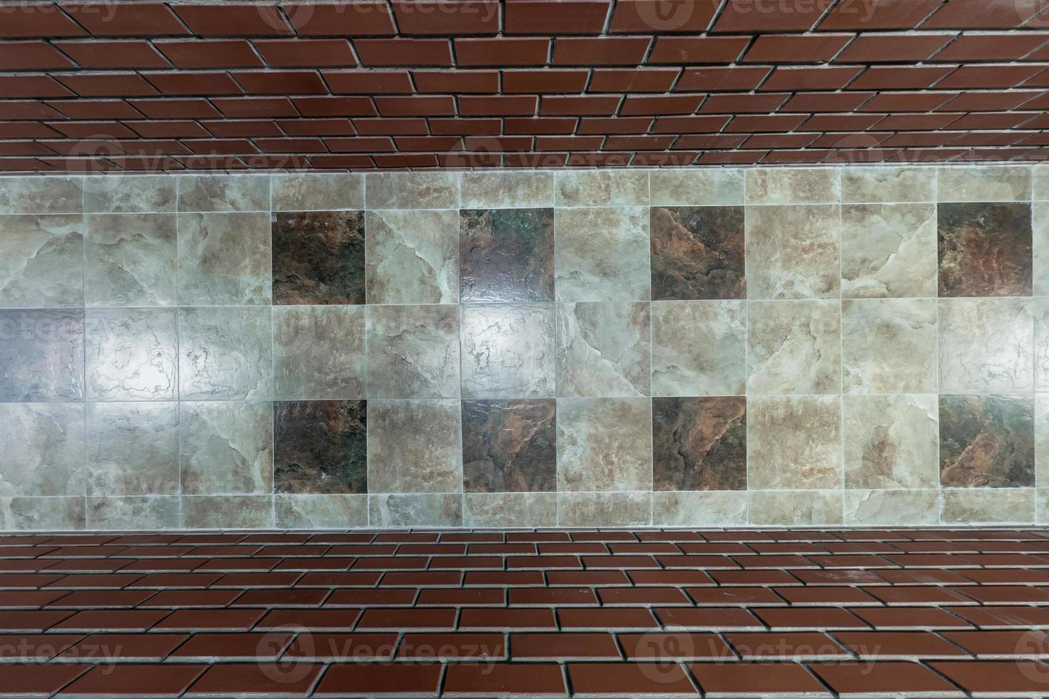 stone and ceramic floor tiles texture in corridor, view from above photo