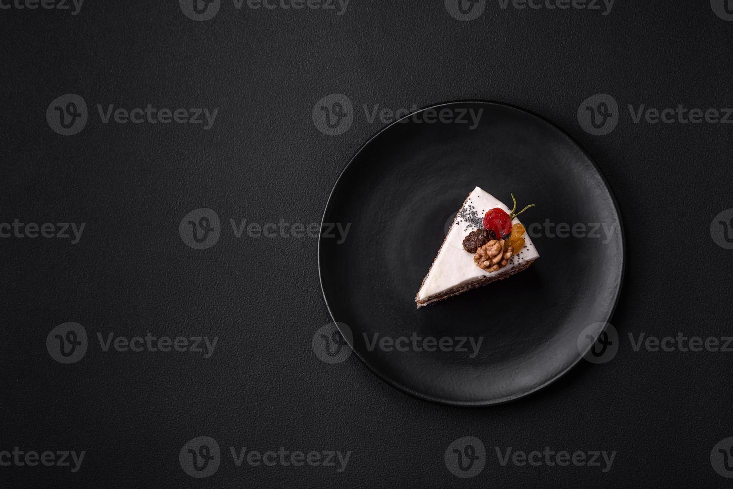 Delicious beautiful piece of cake with cream and berries photo