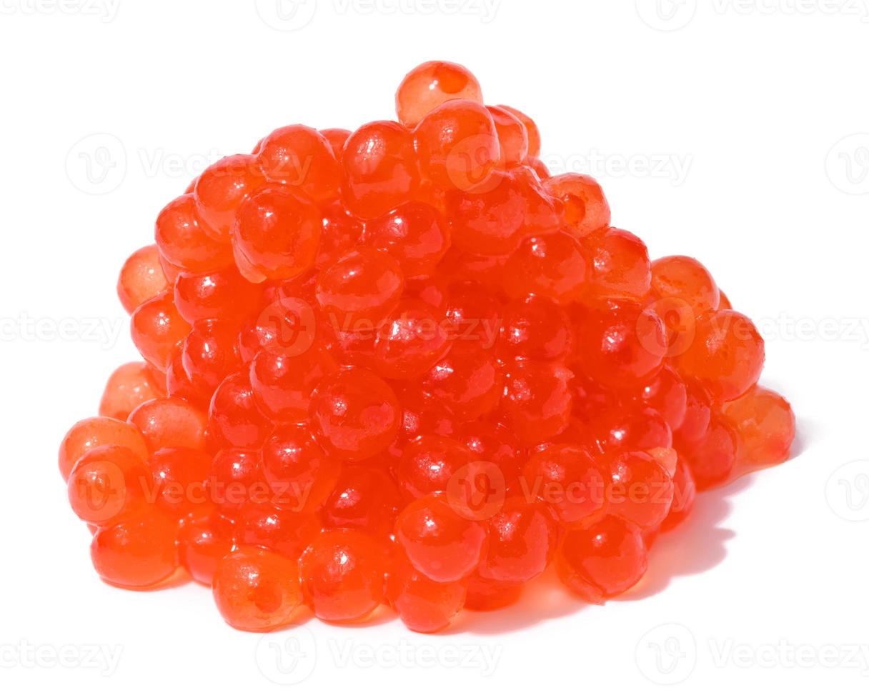 Red caviar on a white isolated background, delicious snack photo