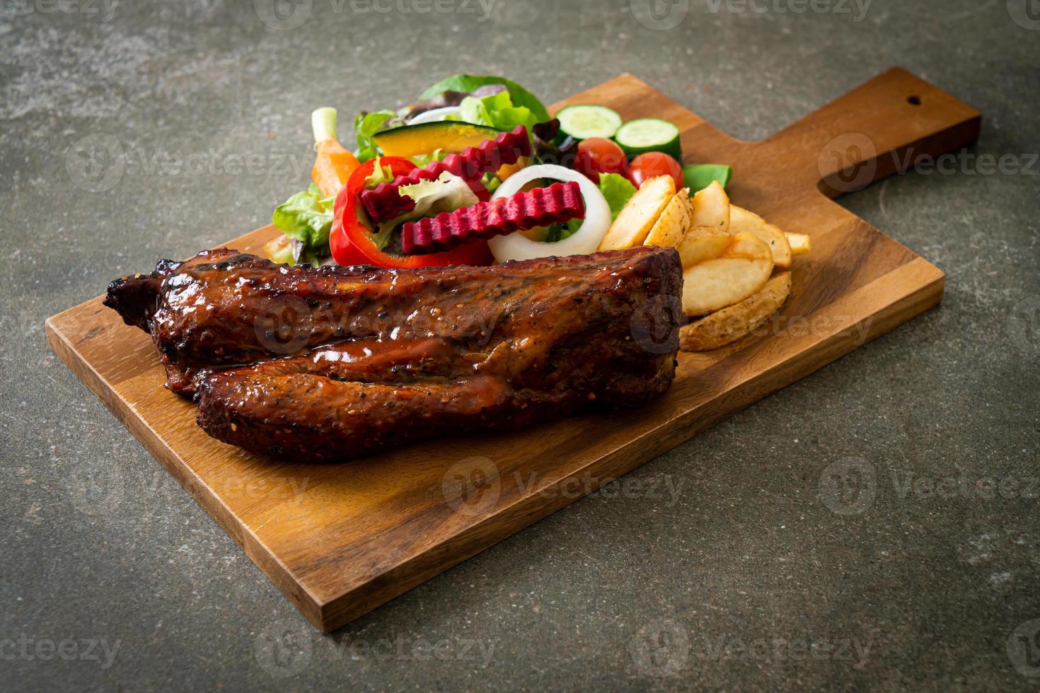 barbecue pork spare ribs with vegetables photo