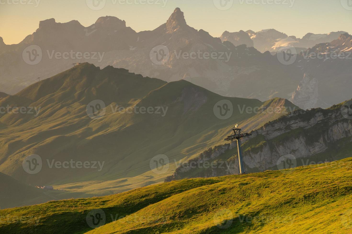 Green mountain landscape with many plains photo