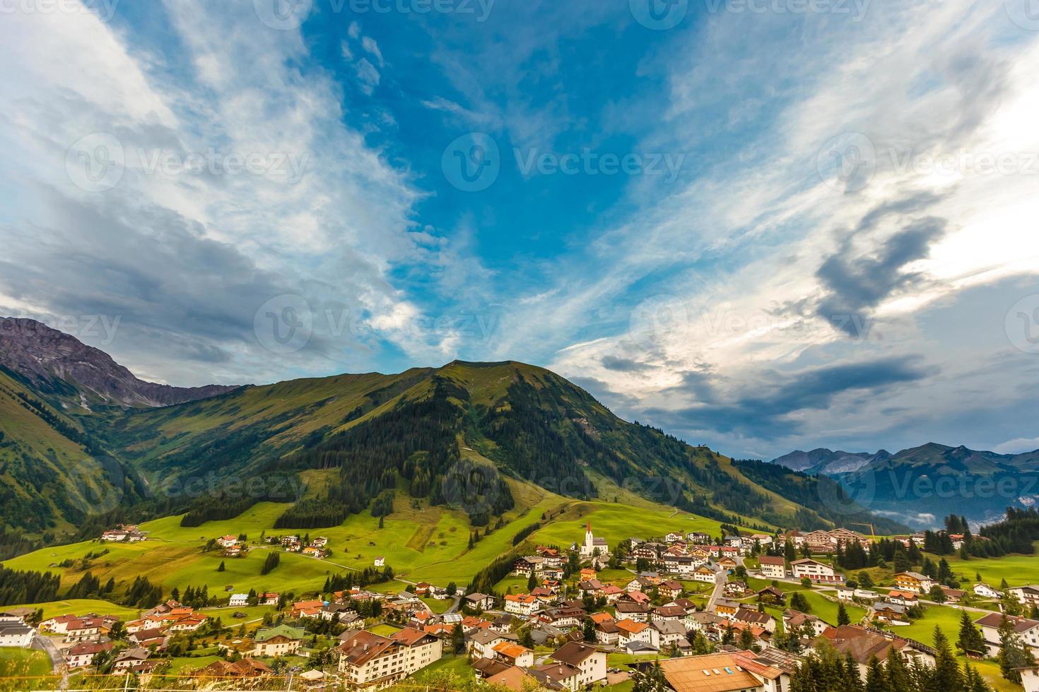 Mountain valley village landscape summer photo