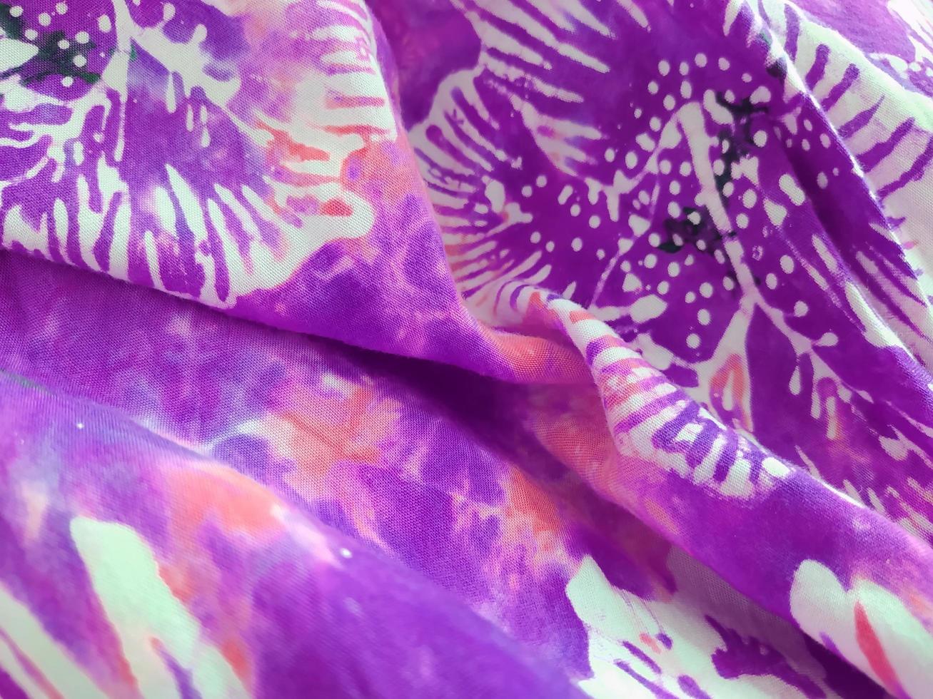 Macro of a piece of beautiful colored fabric. photo