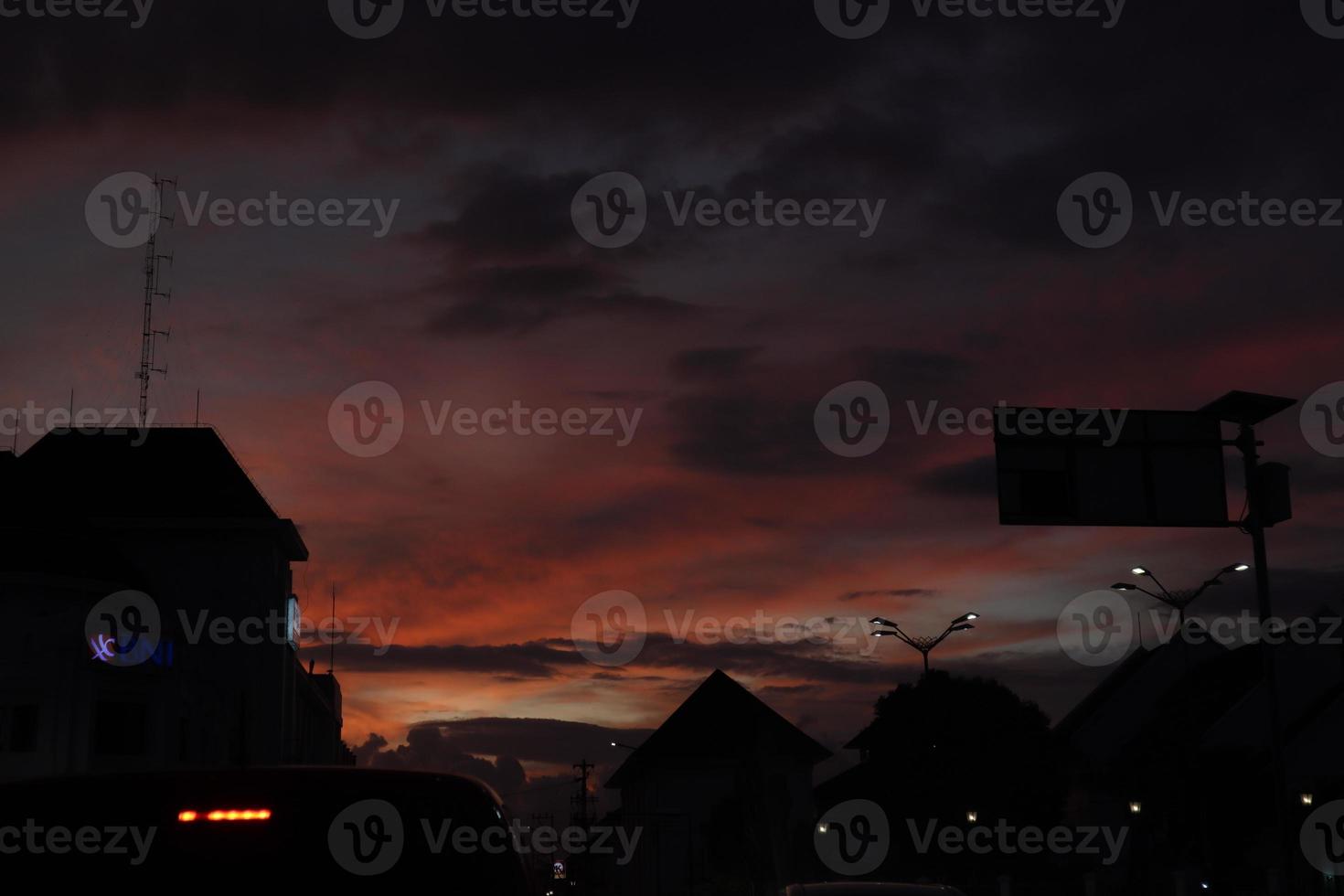 Evening cityscape with sunset background photo