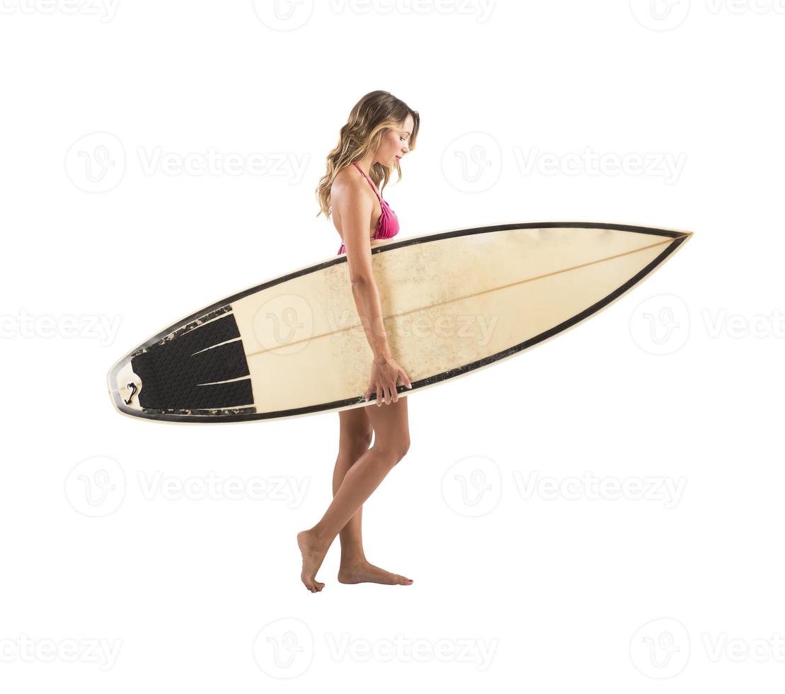 Surfer girl with surf board photo