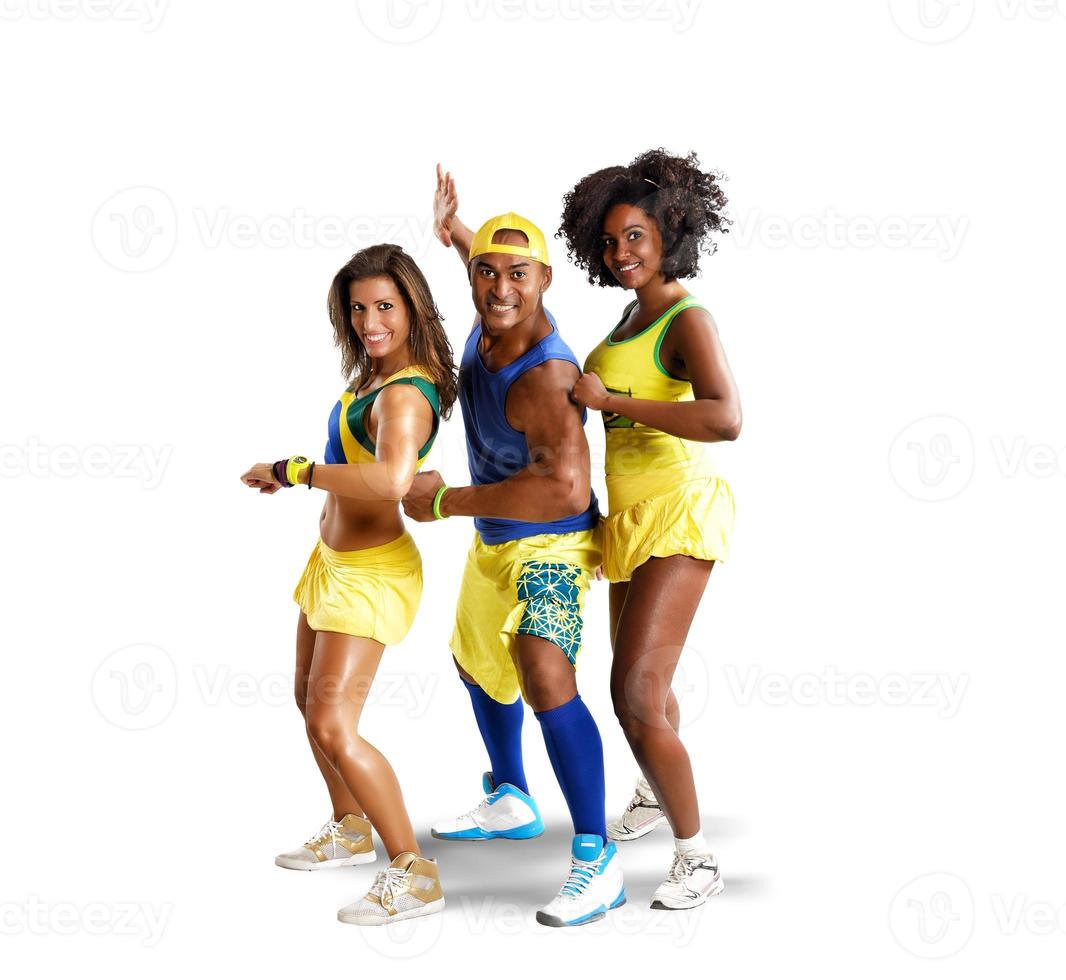 Three dancers in Brazilian clothes photo