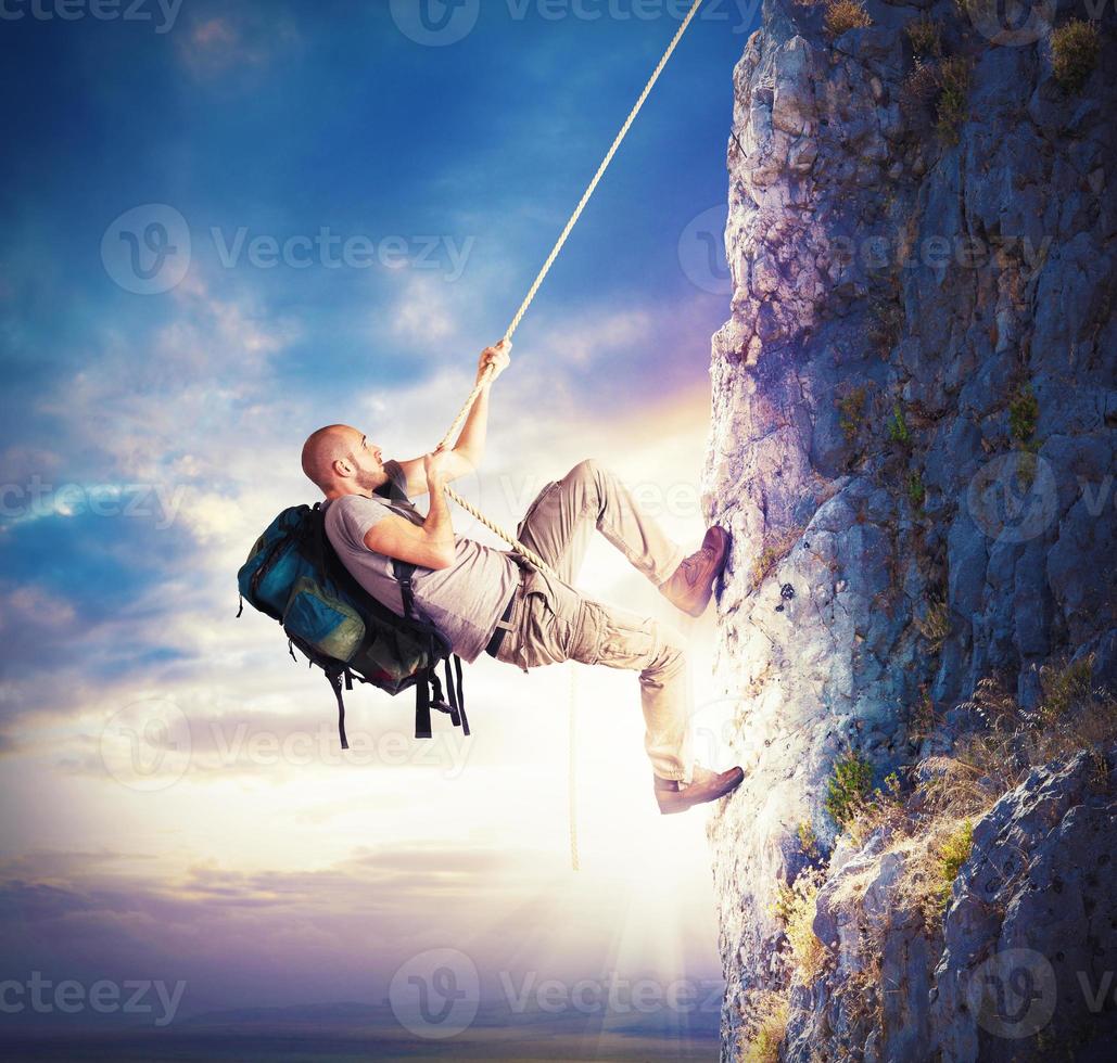 Man Climbing mountains photo